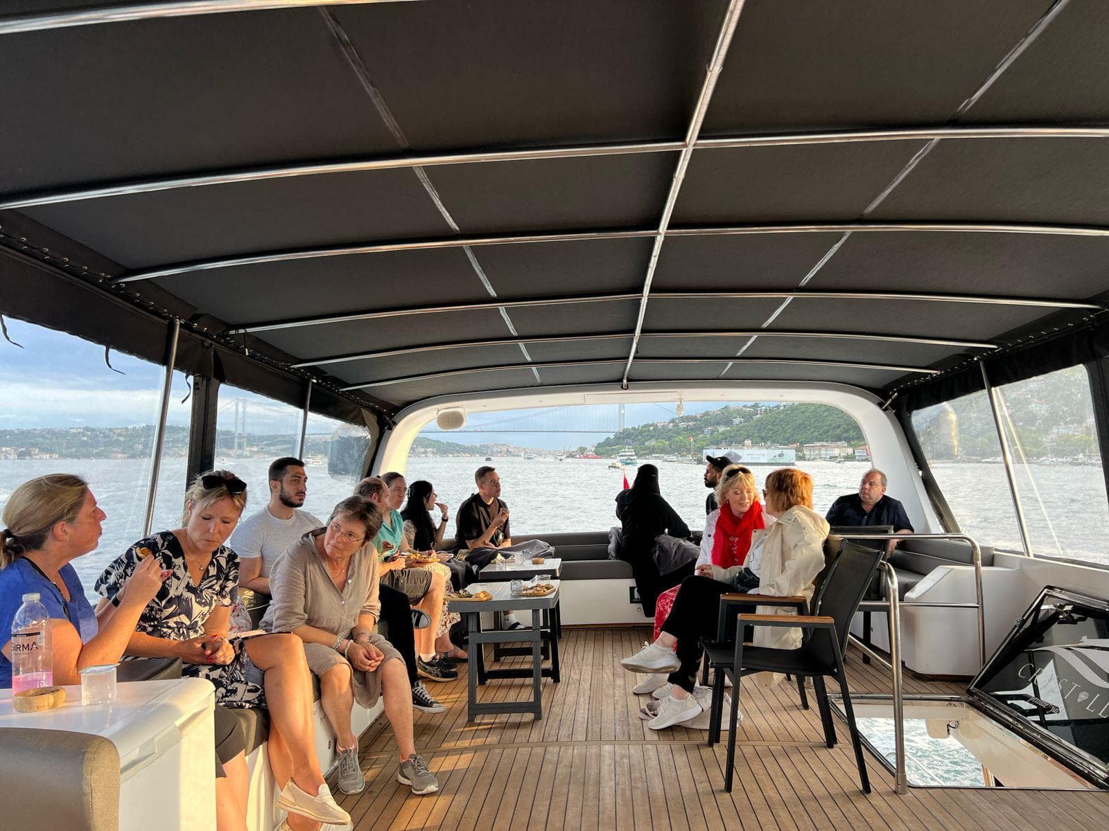 Istanbul Bosphorus panorama at sunset from cruise boat deck